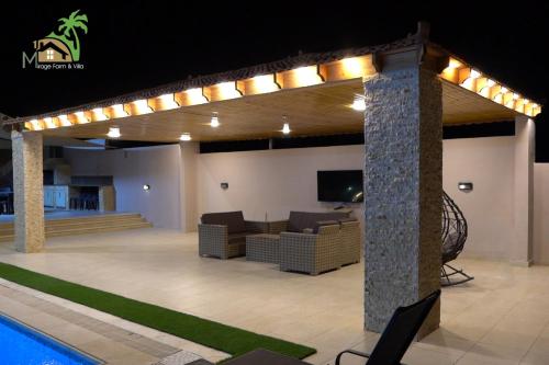 Mirage farme villaの敷地内または近くにあるプール