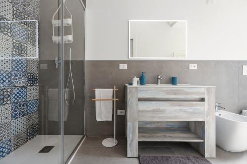 Ένα μπάνιο στο Almaré Apartment Mondello