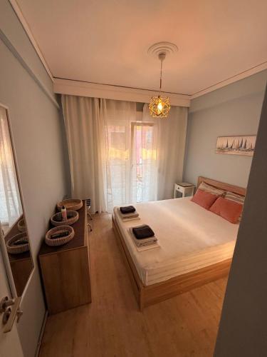 Katil atau katil-katil dalam bilik di YVES Apartament
