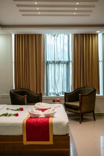 Χώρος καθιστικού στο Royal Plaza Glitz Inn