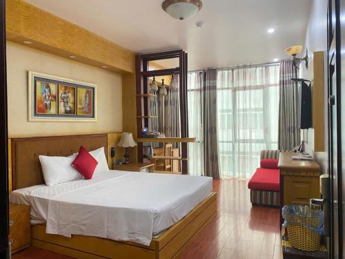 Ένα ή περισσότερα κρεβάτια σε δωμάτιο στο Moon Hotel 56 Truong Cong Giai