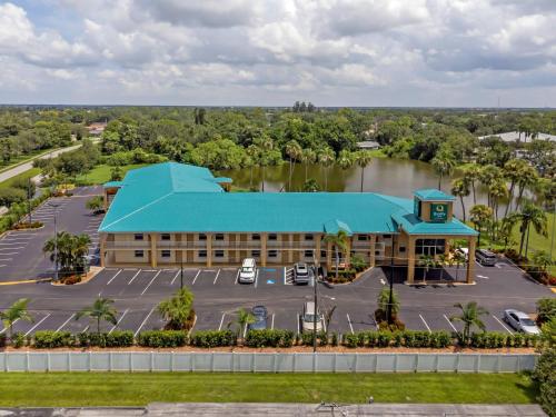 an aerial view of a hotel with a parking lot at Quality Inn Bradenton North I-75 in Bradenton