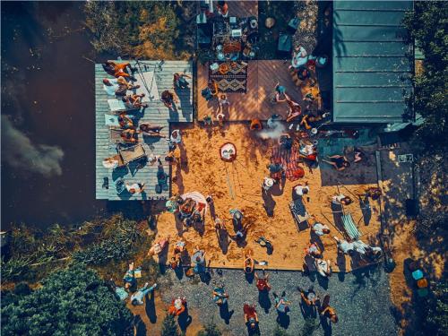 an overhead view of a crowd of people at a beach at Turkusowa Wyspa in Wleń