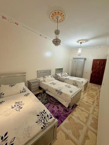 Ένα ή περισσότερα κρεβάτια σε δωμάτιο στο Apartamento con 3 habitaciones ROOMS