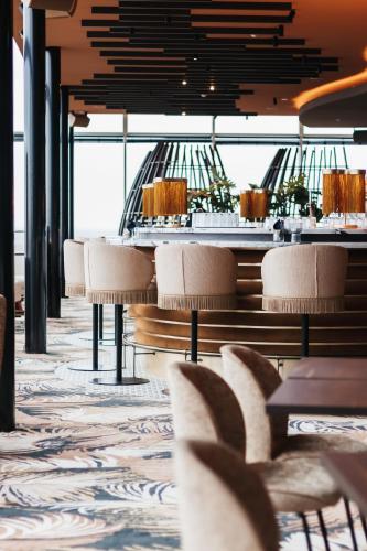 a dining room with chairs and a table at Van der Valk Hotel Eindhoven-Best in Best