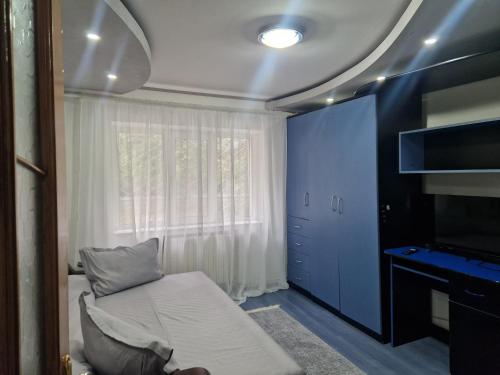 Ένα ή περισσότερα κρεβάτια σε δωμάτιο στο Apartament Vaslui
