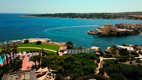 an aerial view of a resort and the ocean at Mangia's Brucoli, Sicily, Autograph Collection in Brucoli