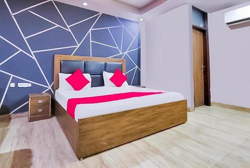 Ένα ή περισσότερα κρεβάτια σε δωμάτιο στο HOTEL RAJANIGANDHA home stay