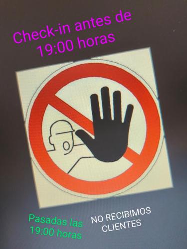a sign that says check in fires de homes at CASA DANIELA APARTAMENTOS-The pilgrim's house apartments in Estella
