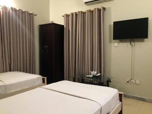 Μια τηλεόραση ή/και κέντρο ψυχαγωγίας στο Mashwani Guest House