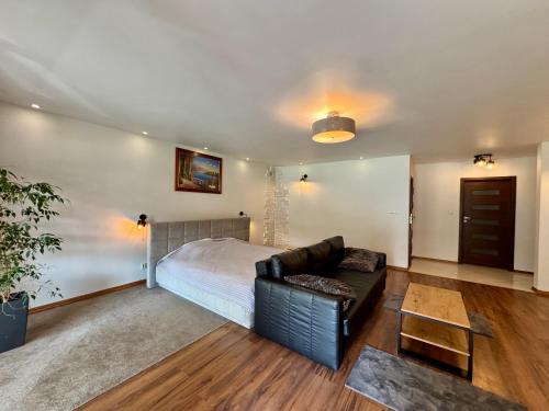 Ένα ή περισσότερα κρεβάτια σε δωμάτιο στο 12 Dębów