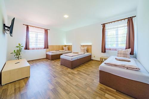 Letto o letti in una camera di Pension Krásno