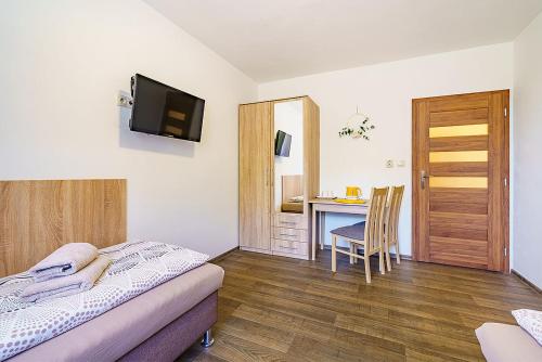 Letto o letti in una camera di Pension Krásno