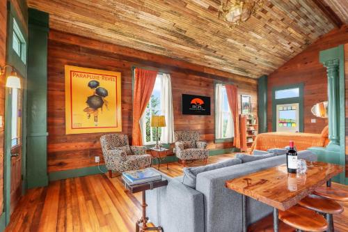 a living room with a couch and a table at Fleur de Tris at Bent Tree Ranch in Lampasas