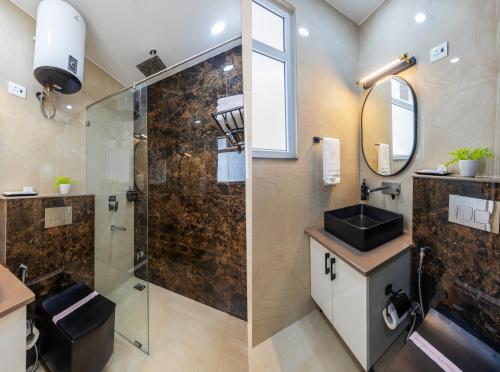 Una cocina o cocineta en Hotel Delight Suites