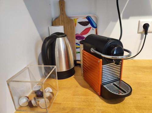 a toaster sitting on top of a wooden table at Ferienhaus am Himberg in Straden
