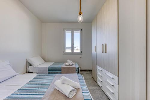 Ένα ή περισσότερα κρεβάτια σε δωμάτιο στο Residence Mia Amelie