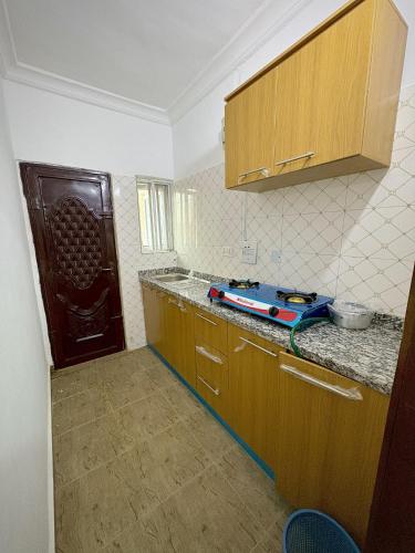 Kuchyň nebo kuchyňský kout v ubytování A4 Service Apartment & Suite