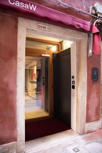 an entrance to a building with an open door at Hotel Casa W in Venice