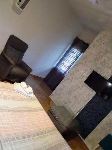 Ruang duduk di Nana Adu Guest House