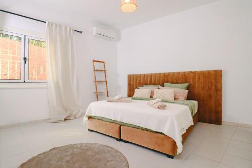 Postel nebo postele na pokoji v ubytování Casa Nova Maison moderne à deux pas de la plage