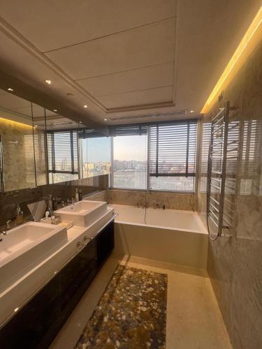 Vonios kambarys apgyvendinimo įstaigoje Moison Penthouse