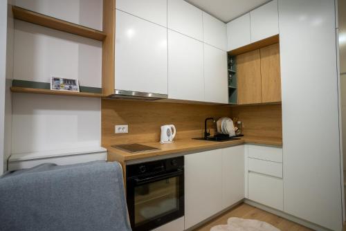 Kuchyň nebo kuchyňský kout v ubytování Apartment Veyra