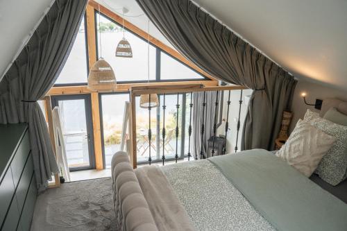 Ένα ή περισσότερα κρεβάτια σε δωμάτιο στο Studio Lakeview