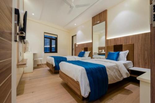 Ένα ή περισσότερα κρεβάτια σε δωμάτιο στο Hotel Pritam, Nagpur