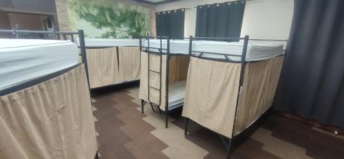 Postel nebo postele na pokoji v ubytování Хостел ФИЛИН
