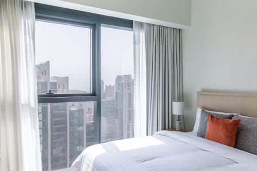 Un ou plusieurs lits dans un hébergement de l'établissement Stunning 2 bed dubai mall burj khalifa downtown ACT 1