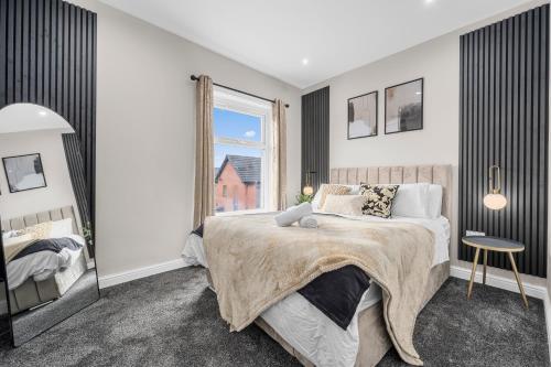 Ένα ή περισσότερα κρεβάτια σε δωμάτιο στο Sleek & Sunny 2BR -The Gallery House - Sleeps 5 - Family Friendly
