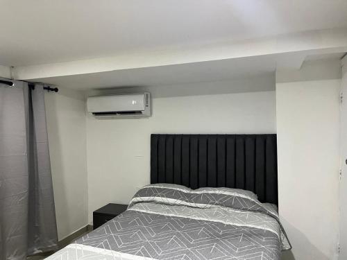 Postel nebo postele na pokoji v ubytování Aparta estudio confortable y completo