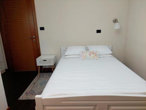 Ένα ή περισσότερα κρεβάτια σε δωμάτιο στο Apartment Larin