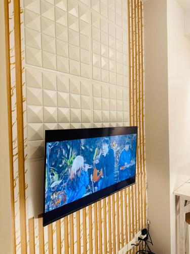 TV a/nebo společenská místnost v ubytování Mplace residence tower A
