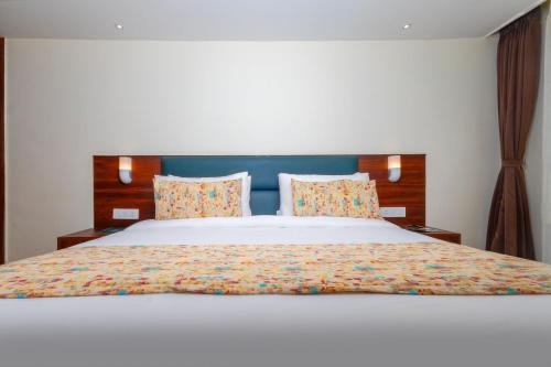 Cama o camas de una habitación en Sumitel JB Park