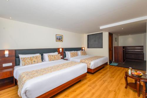 Cama o camas de una habitación en Sumitel JB Park