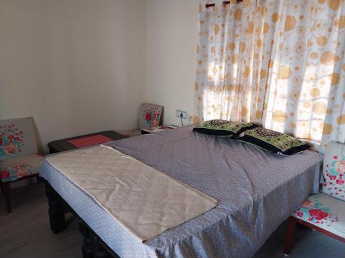 Postel nebo postele na pokoji v ubytování Terrace Room