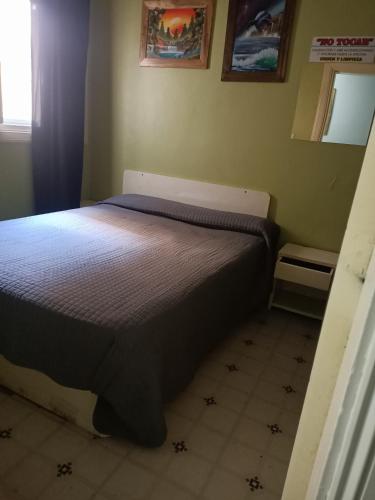 Katil atau katil-katil dalam bilik di Hotel Roy's
