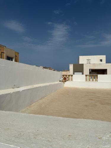 an empty skateboard ramp in front of a building at Villa Ryma in Kelibia Center in Kelibia