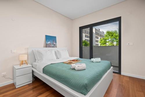 Rooftop Pools & Balcony Haven by HostWise