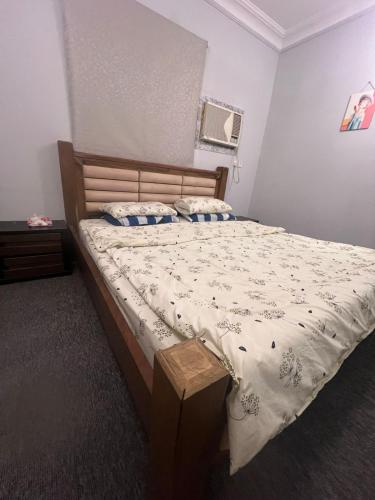Кровать или кровати в номере The Smart Studio 102