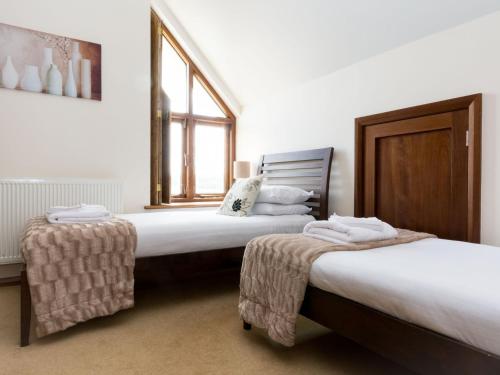 11 Bed in Instow REDLAにあるベッド
