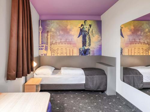 Postel nebo postele na pokoji v ubytování B&B Hotel Stuttgart-Vaihingen