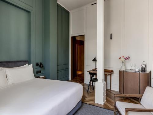 Letto o letti in una camera di Mercer Plaza Sevilla 5 GL