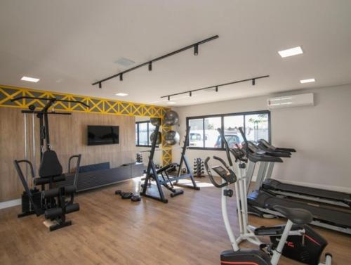 O centro de fitness e/ou as comodidades de fitness de Apartamnto Lisittá