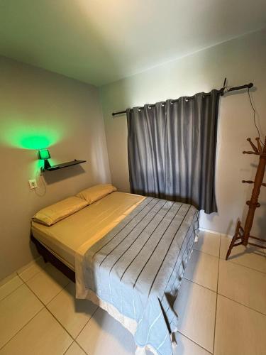 Postel nebo postele na pokoji v ubytování Loft - Ubatuba - São Francisco do Sul