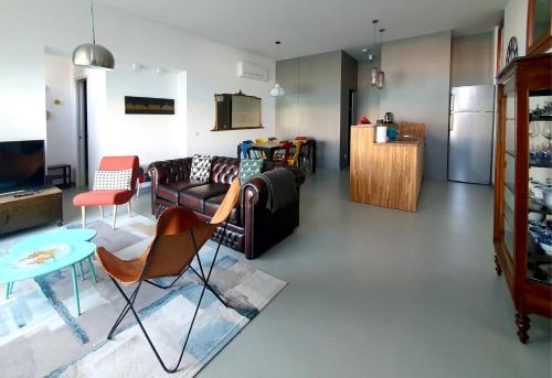 a living room with a couch and a table at San Mark's basin best view in Venice