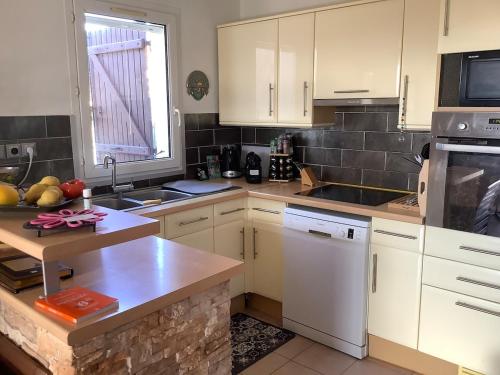 Η κουζίνα ή μικρή κουζίνα στο Peaceful haven