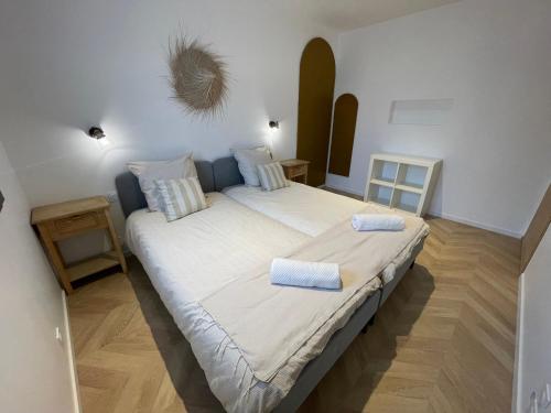 Ένα ή περισσότερα κρεβάτια σε δωμάτιο στο Appartement Le 2